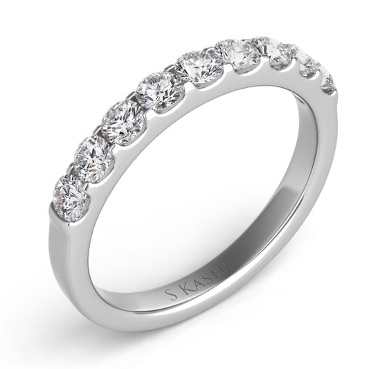 This Band is available in 14K White Gold. There are a total of 9 stones. There are Round with a total carat weight of 0.65 set in a Prong Set setting.