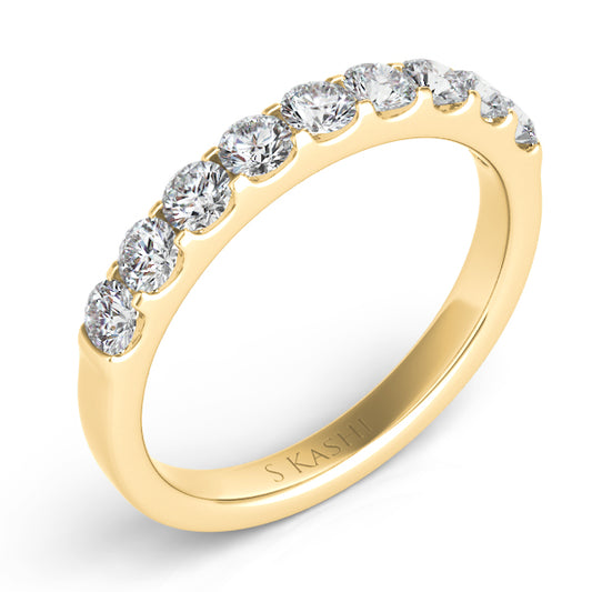 This Band is available in 14K Yellow Gold. There are a total of 9 stones. There are Round with a total carat weight of 0.65 set in a Prong Set setting.