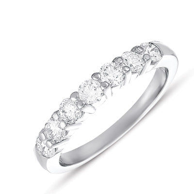 This Band is available in 14K White Gold. There are a total of 7 stones. There are Round with a total carat weight of 0.7 set in a Micro Prong setting.