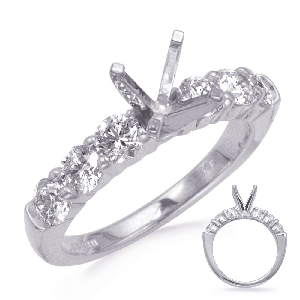 This Engagement Ring  is available in 14K White Gold. There are a total of 6 stones. There are Rounds with a total carat weight of 0.96 set in a Prong Set setting.