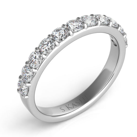 This Band is available in 14K White Gold. There are a total of 11 stones. There are Round with a total carat weight of 0.79 set in a Prong Set setting.