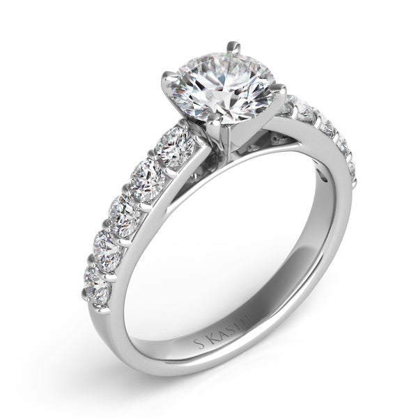 This Engagement Ring  is available in 14K White Gold. There are a total of 10 stones. There are Rounds with a total carat weight of 0.72 set in a Prong Set setting.