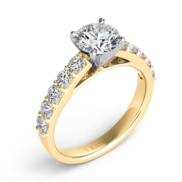 This Engagement Ring  is available in 14K Yellow Gold. There are a total of 10 stones. There are Rounds with a total carat weight of 0.72 set in a Prong Set setting.