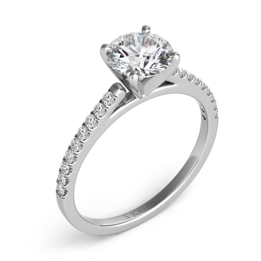 This Engagement Ring  is available in 14K White Gold. There are a total of 18 stones. There are Rounds with a total carat weight of 0.18 set in a Prong Set setting.
