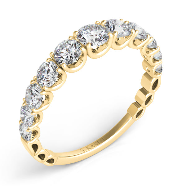 This Band is available in 14K Yellow Gold. There are a total of 11 stones. There are Round with a total carat weight of 1.16 set in a Prong Set setting.