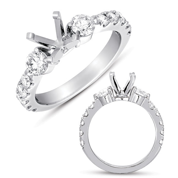 This Engagement Ring  is available in 14K White Gold. There are a total of 12 stones. There are Rounds with a total carat weight of 1.04 set in a Prong Set setting.