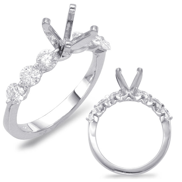 This Engagement Ring  is available in 14K White Gold. There are a total of 6 stones. There are Rounds with a total carat weight of 0.68 set in a Shared Prongs setting.