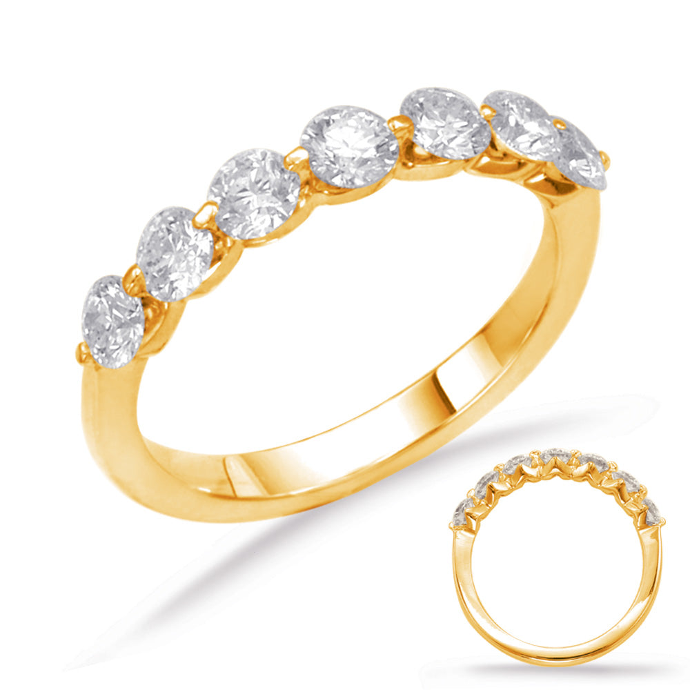 This Band is available in 14K Yellow Gold. There are a total of 7 stones. There are Round with a total carat weight of 0.79 set in a Shared Prongs setting.