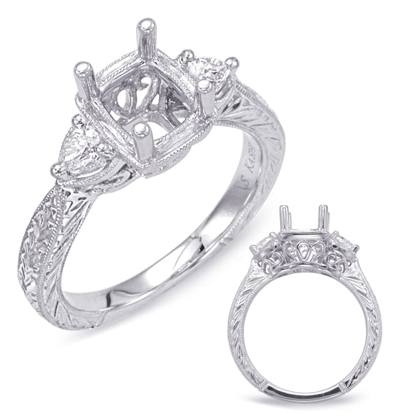 This Engagement Ring  is available in 14K White Gold. There are a total of 2 stones. There are Pear Shape with a total carat weight of 0.18 set in a Prong Set setting.