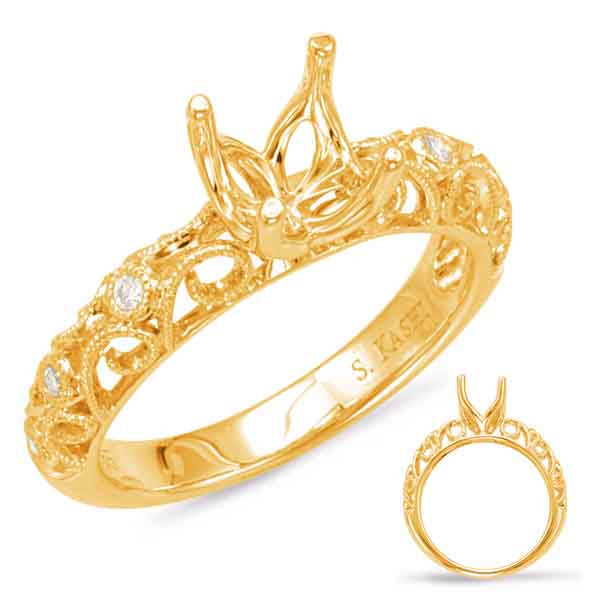 This Engagement Ring  is available in 14K Yellow Gold. There are a total of 6 stones. There are Rounds with a total carat weight of 0.06 set in a Bezel Set setting.