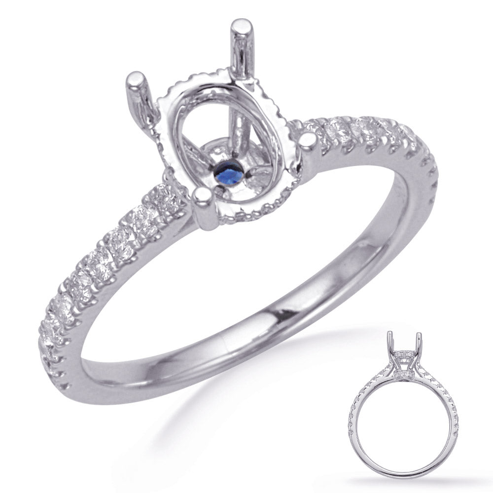 This Engagement Ring  is available in 14K White Gold. There are a total of 45 stones. There are Rounds with a total carat weight of 0.49 set in a Bezel Set|Micro Pave setting.There are Sapphire stones with a total carat weight of 0.05 set in a Bezel Set|Micro Pave.