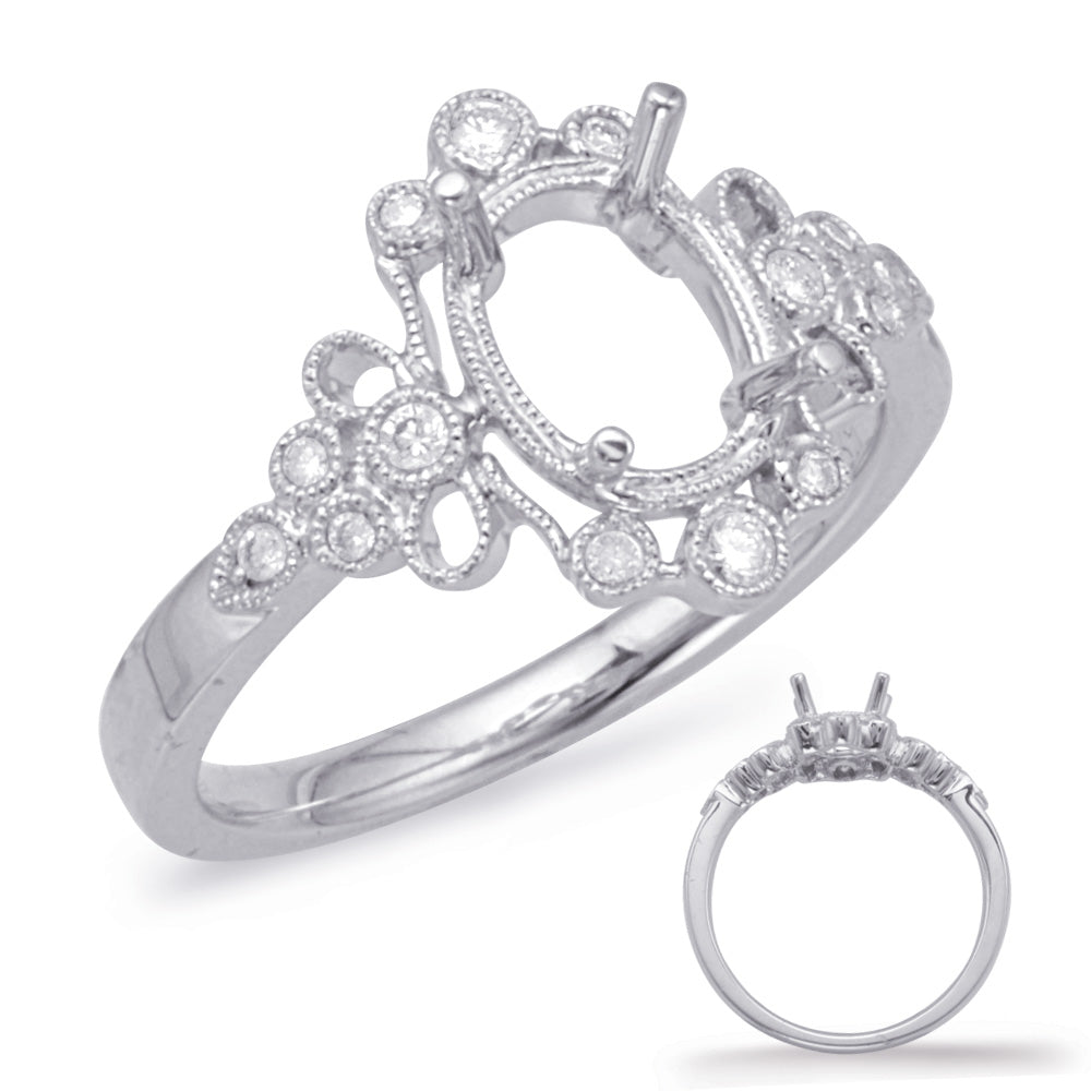 This Engagement Ring  is available in 14K White Gold. There are a total of 14 stones. There are Rounds with a total carat weight of 0.21 set in a Bezel Set setting.