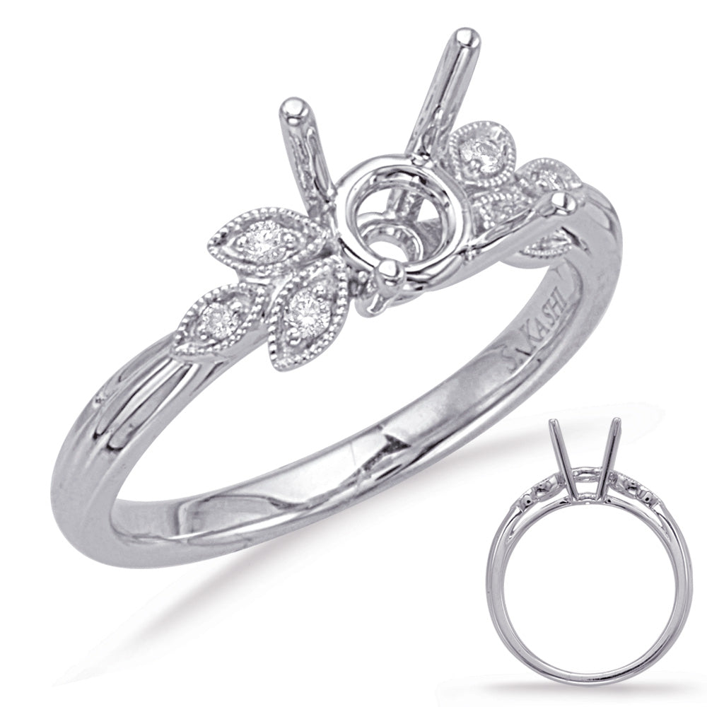 This Engagement Ring  is available in 14K White Gold. There are a total of 6 stones. There are Rounds with a total carat weight of 0.07 set in a Micro Prong setting.