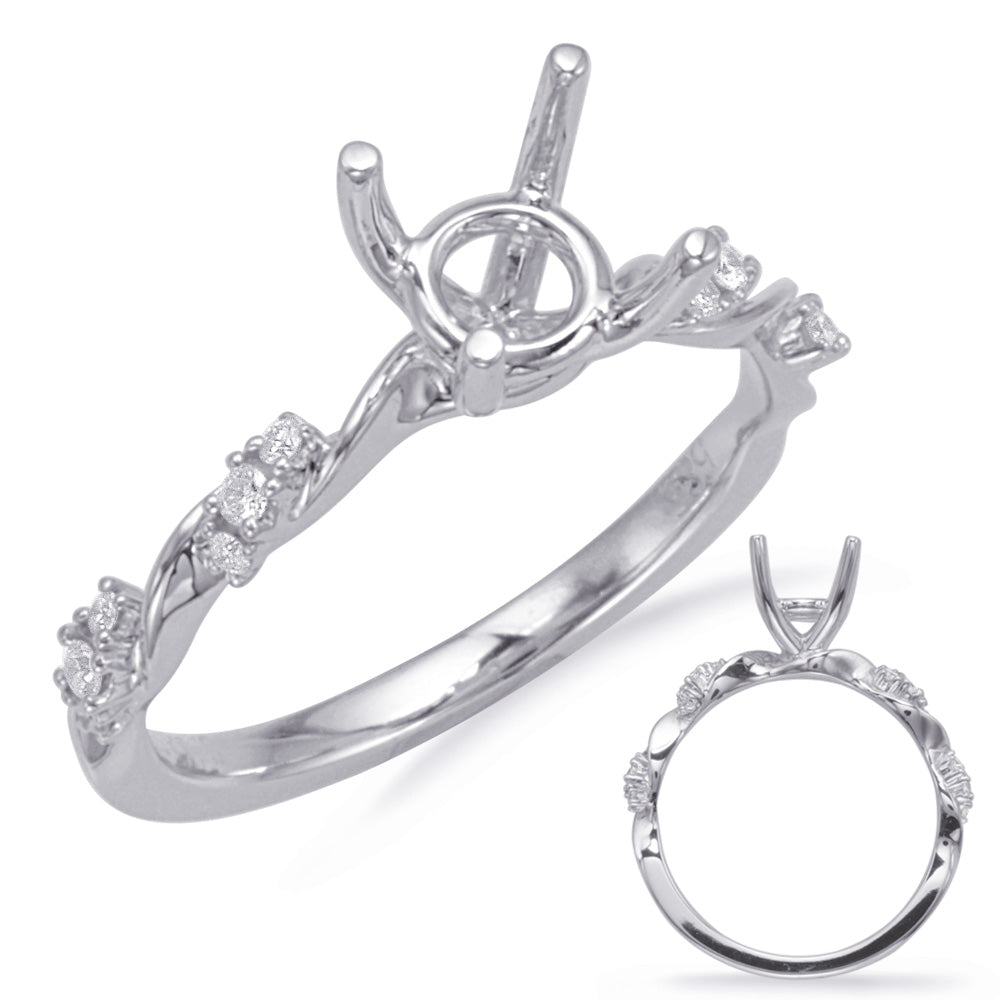 This Engagement Ring  is available in 14K White Gold. There are a total of 12 stones. There are Rounds with a total carat weight of 0.11 set in a Micro Prong setting.