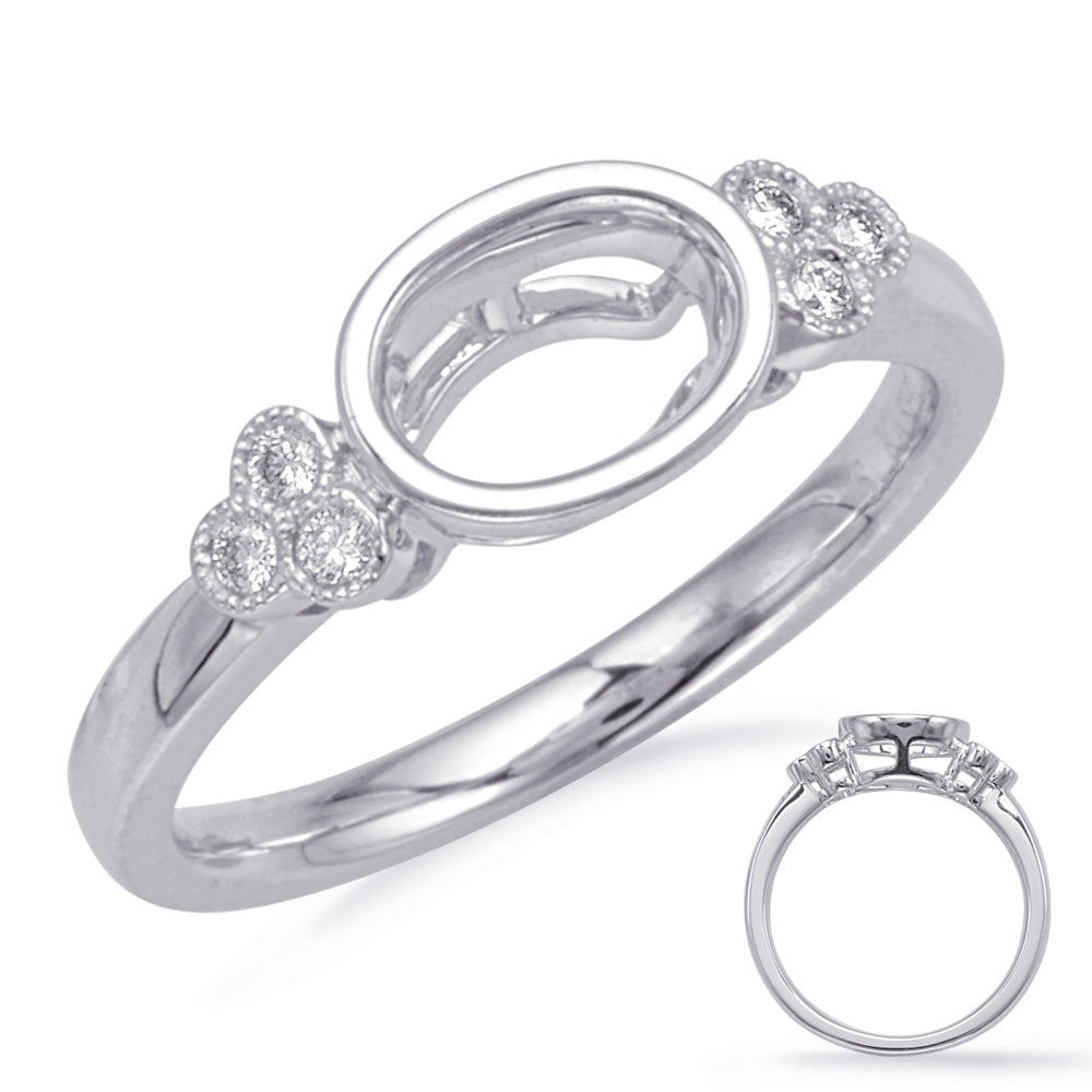 This Engagement Ring  is available in 14K White Gold. There are a total of 6 stones. There are Rounds with a total carat weight of 0.08 set in a Bezel Set setting.