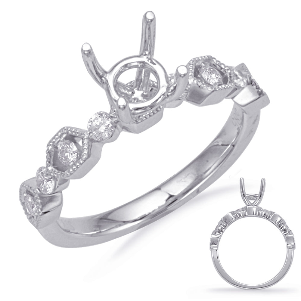 This Engagement Ring  is available in 14K White Gold. There are a total of 8 stones. There are Rounds with a total carat weight of 0.26 set in a Prong Set setting.