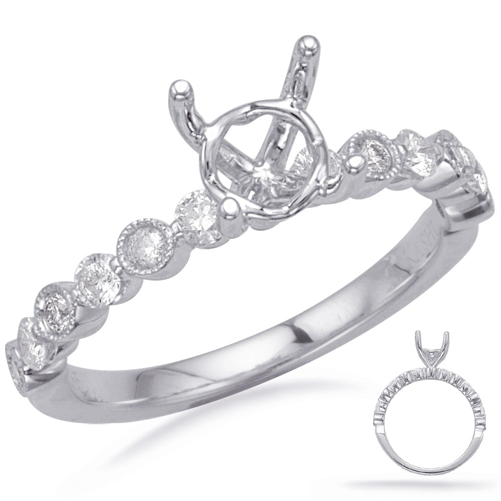 This Engagement Ring  is available in 14K White Gold. There are a total of 12 stones. There are Rounds with a total carat weight of 0.34 set in a Bezel Set|Prong Set setting.