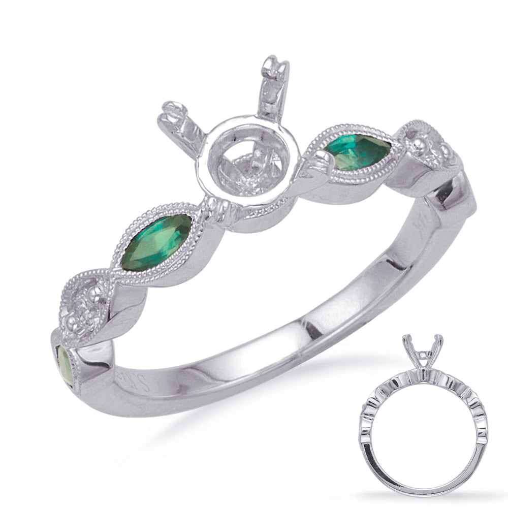 This Engagement Ring  is available in 14K White Gold. There are a total of 6 stones. There are Emerald with a total carat weight of 0.27 set in a Bezel Set|Prong Set setting.There are Rounds stones with a total carat weight of 0.06 set in a Bezel Set|Prong Set.
