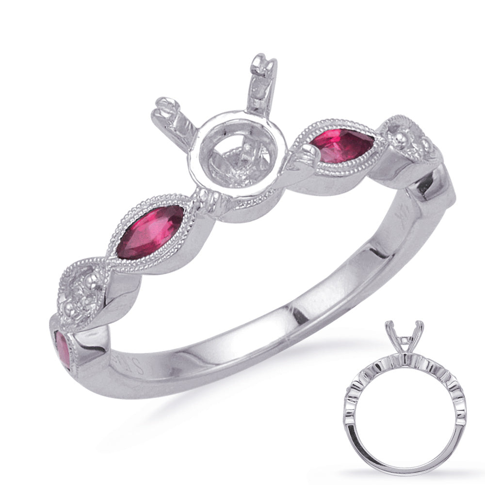 This Engagement Ring  is available in 14K White Gold. There are a total of 6 stones. There are Rounds with a total carat weight of 0.06 set in a Bezel Set|Prong Set setting.There are Ruby stones with a total carat weight of 0.49 set in a Bezel Set|Prong Set.