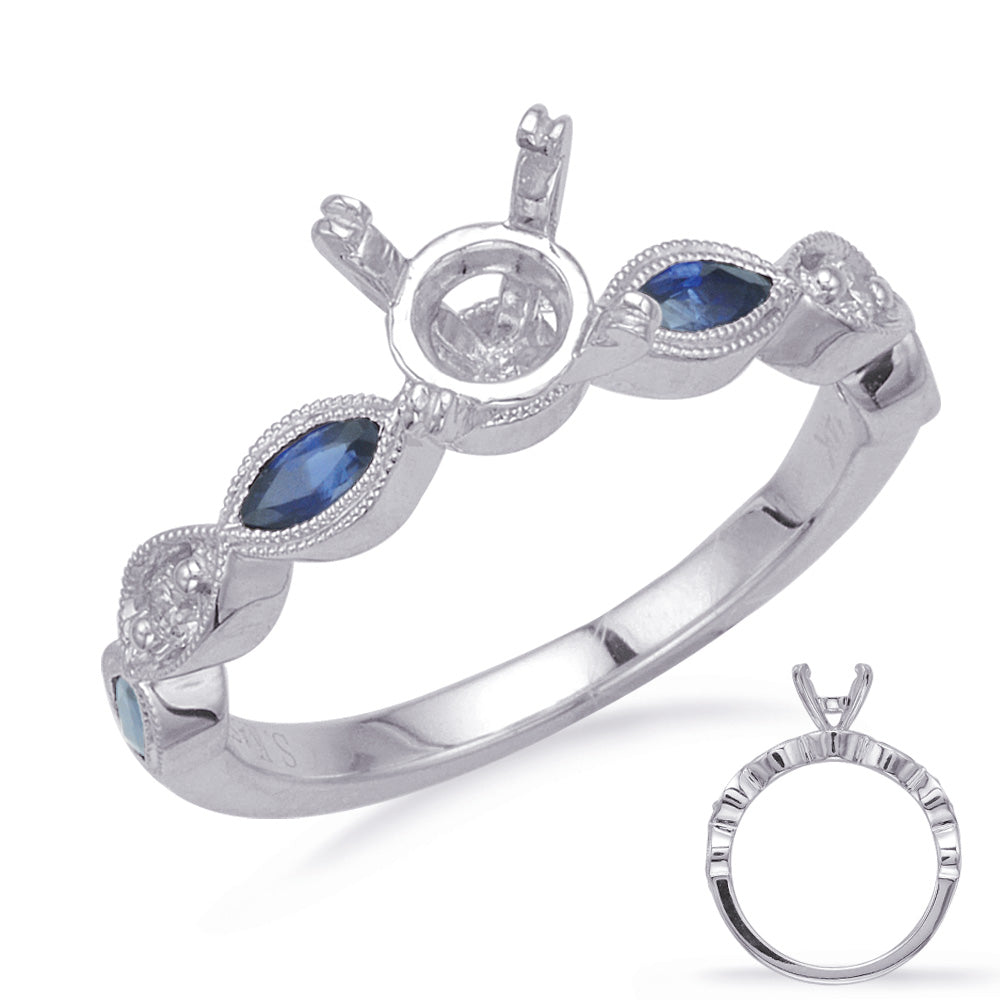 This Engagement Ring  is available in 14K White Gold. There are a total of 6 stones. There are Rounds with a total carat weight of 0.06 set in a Bezel Set|Prong Set setting.There are Sapphire stones with a total carat weight of 0.43 set in a Bezel Set|Prong Set.