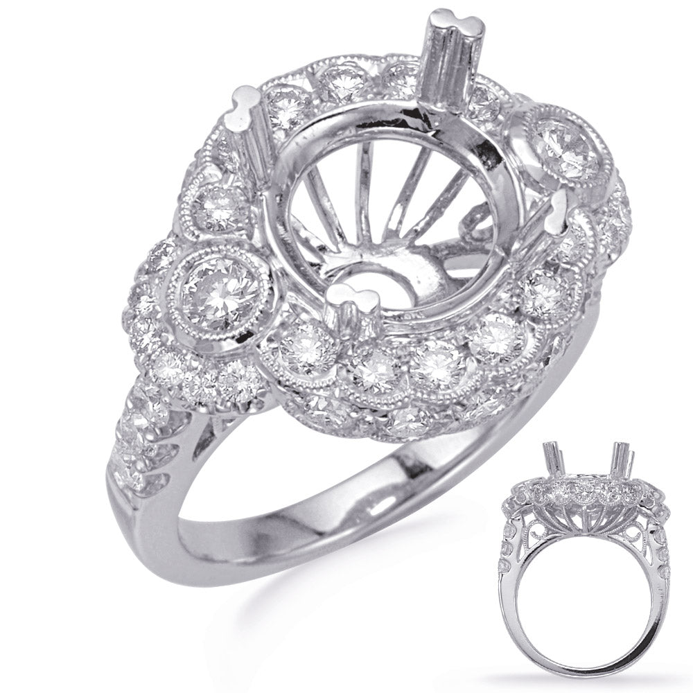 This Engagement Ring  is available in 14K White Gold. There are a total of 40 stones. There are Rounds with a total carat weight of 1.18 set in a Bezel Set|Prong Set setting.