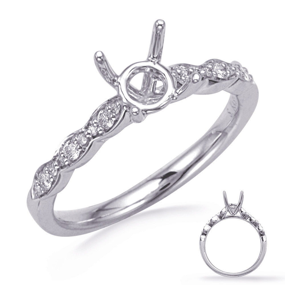 This Engagement Ring  is available in 14K White Gold. There are a total of 18 stones. There are Rounds with a total carat weight of 0.11 set in a Prong Set setting.
