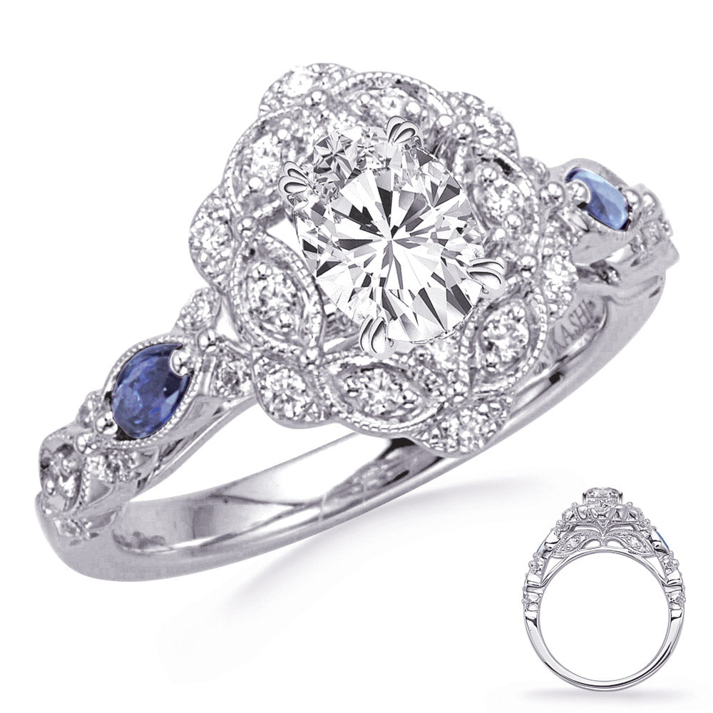 This Engagement Ring  is available in 14K White Gold. There are a total of 34 stones. There are Rounds with a total carat weight of 0.31 set in a Prong Set setting.There are Sapphire stones with a total carat weight of 0.17 set in a Prong Set.