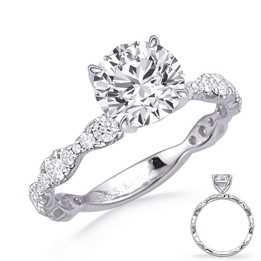 This Engagement Ring  is available in 14K White Gold. There are a total of 32 stones. There are Rounds with a total carat weight of 0.58 set in a Prong Set setting.
