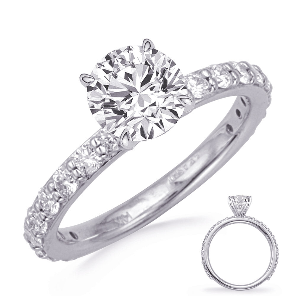 This Engagement Ring  is available in 14K White Gold. There are a total of 18 stones. There are Rounds with a total carat weight of 0.7 set in a Prong Set setting.