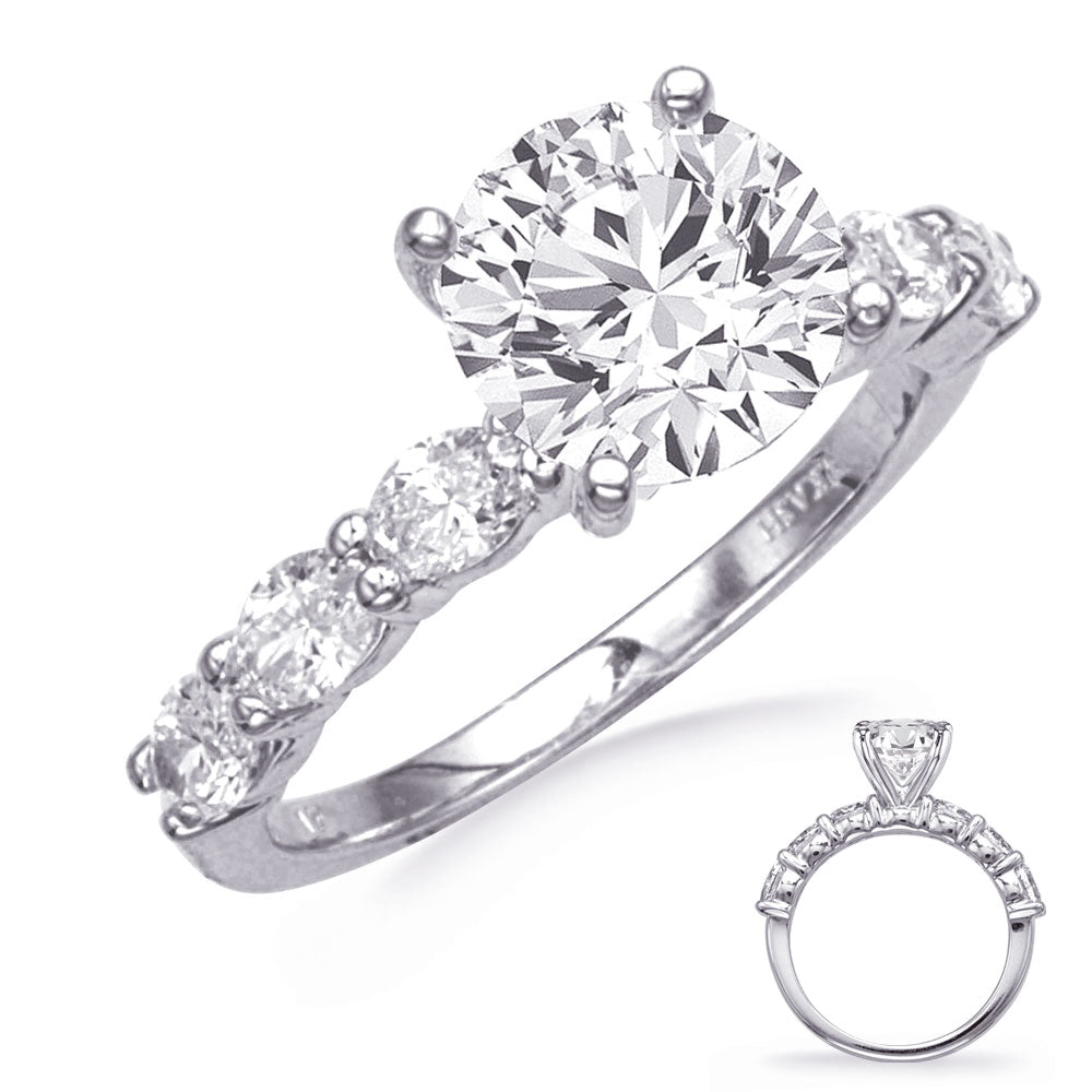 This Engagement Ring  is available in 14K White Gold. There are a total of 6 stones. There are Oval with a total carat weight of 0.86 set in a  setting.