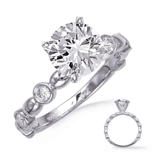 This Engagement Ring  is available in 14K White Gold. There are a total of 6 stones. There are Rounds with a total carat weight of 0.3 set in a Bezel Set setting.