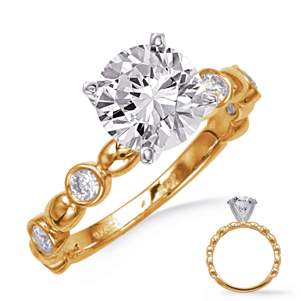 This Engagement Ring  is available in 14K Yellow Gold. There are a total of 6 stones. There are Rounds with a total carat weight of 0.3 set in a Bezel Set setting.