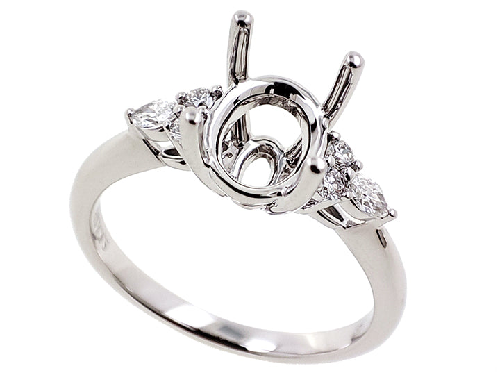 This Engagement Ring  is available in 14K White Gold. There are a total of 6 stones. There are Marquise with a total carat weight of 0.1 set in a Prong Set setting.There are Rounds stones with a total carat weight of 0.09 set in a Prong Set.
