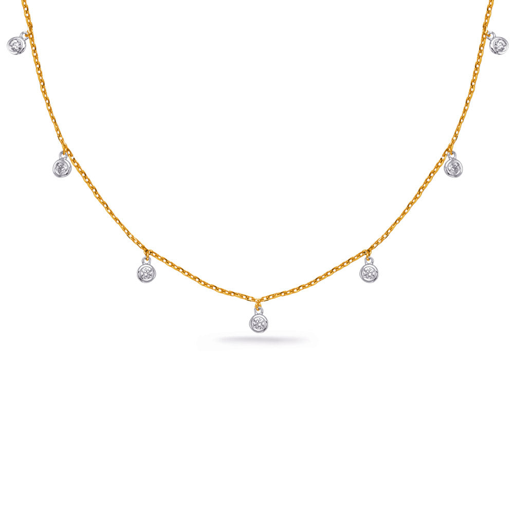 This Necklace is available in 14K Yellow & White Gold. There are a total of 7 stones. There are Rounds with a total carat weight of 0.3 set in a  setting.