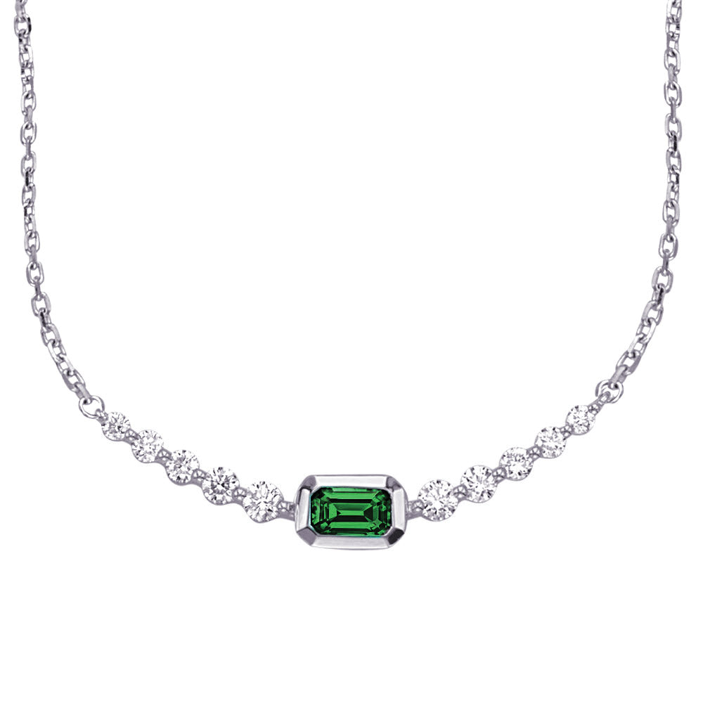This Necklace is available in 14K White Gold. There are a total of 11 stones. There are Emerald with a total carat weight of 0.27 set in a Bezel Set|Shared Prongs setting.There are Rounds stones with a total carat weight of 0.33 set in a Bezel Set|Shared Prongs.