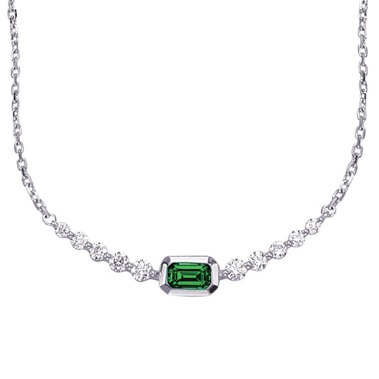 This Necklace is available in 14K White Gold. There are a total of 11 stones. There are Emerald with a total carat weight of 0.27 set in a Bezel Set|Shared Prongs setting.There are Rounds stones with a total carat weight of 0.33 set in a Bezel Set|Shared Prongs.