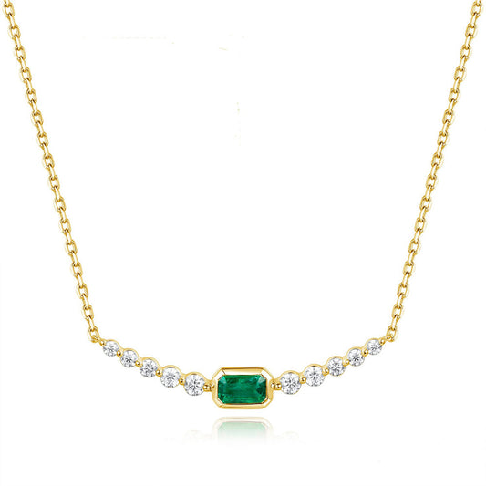 This Necklace is available in 14K Yellow Gold. There are a total of 11 stones. There are Emerald with a total carat weight of 0.27 set in a Bezel Set|Shared Prongs setting.There are Rounds stones with a total carat weight of 0.33 set in a Bezel Set|Shared Prongs.