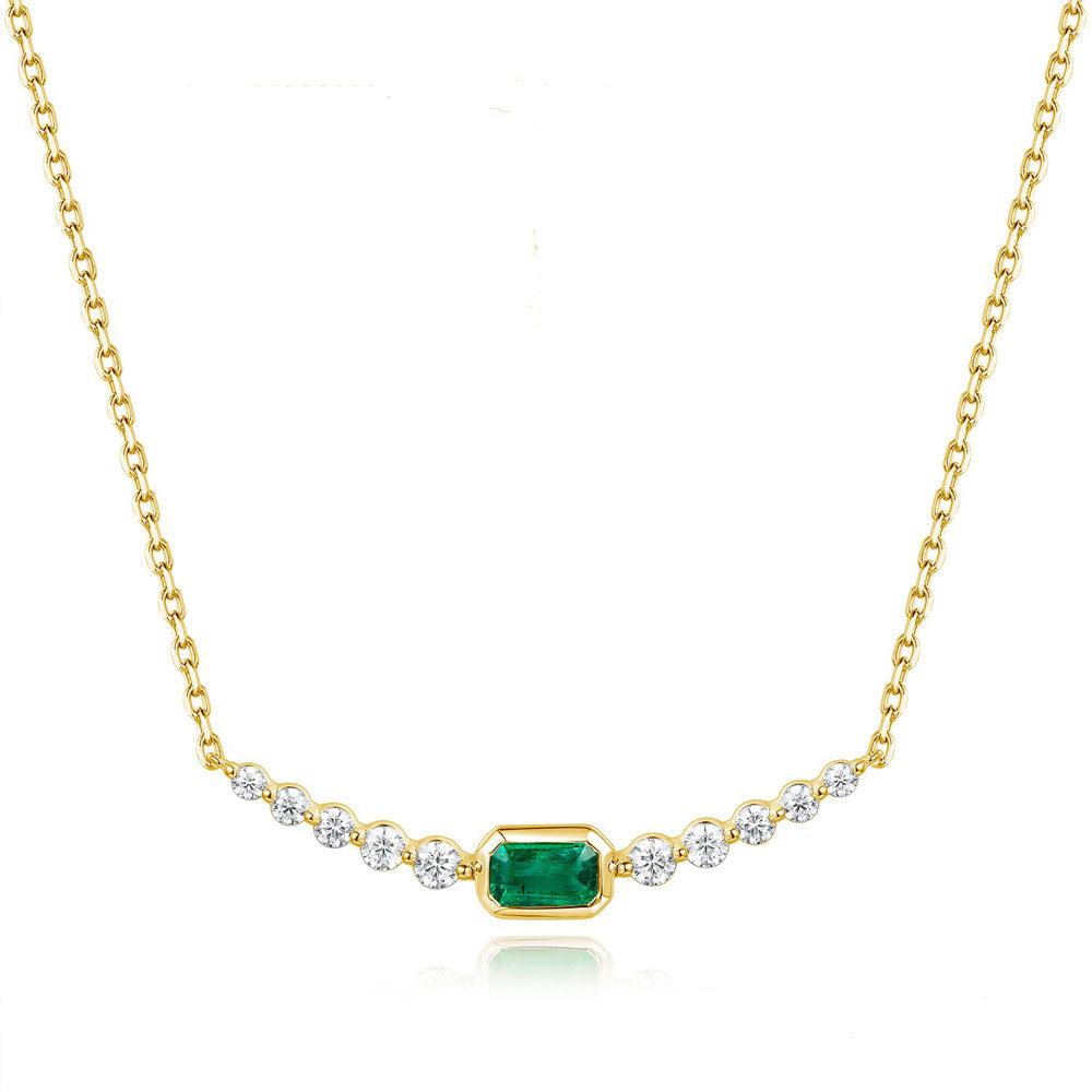 This Necklace is available in 14K Yellow Gold. There are a total of 11 stones. There are Emerald with a total carat weight of 0.27 set in a Bezel Set|Shared Prongs setting.There are Rounds stones with a total carat weight of 0.33 set in a Bezel Set|Shared Prongs.