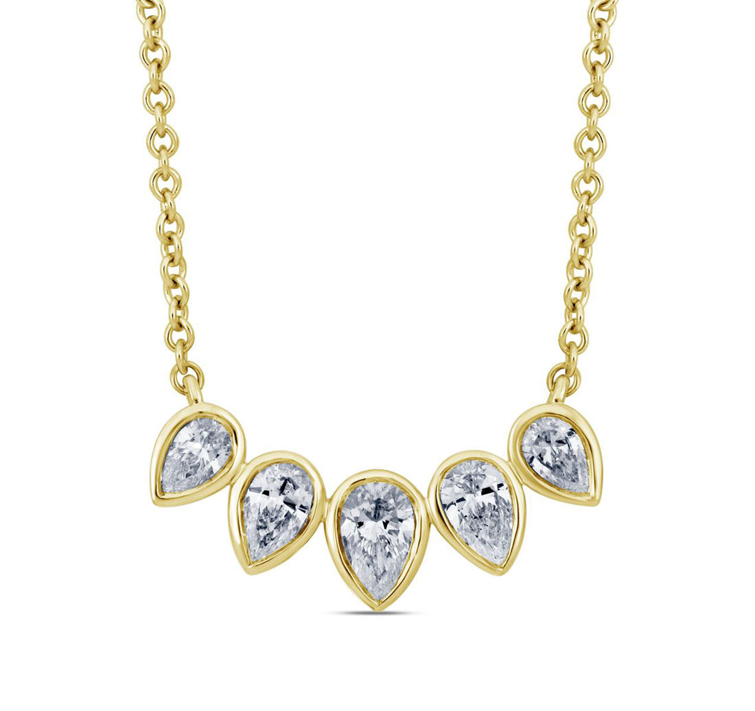 This Necklace is available in 14K Yellow Gold. There are a total of 5 stones. There are Pear Shape with a total carat weight of 1 set in a Bezel Set setting.