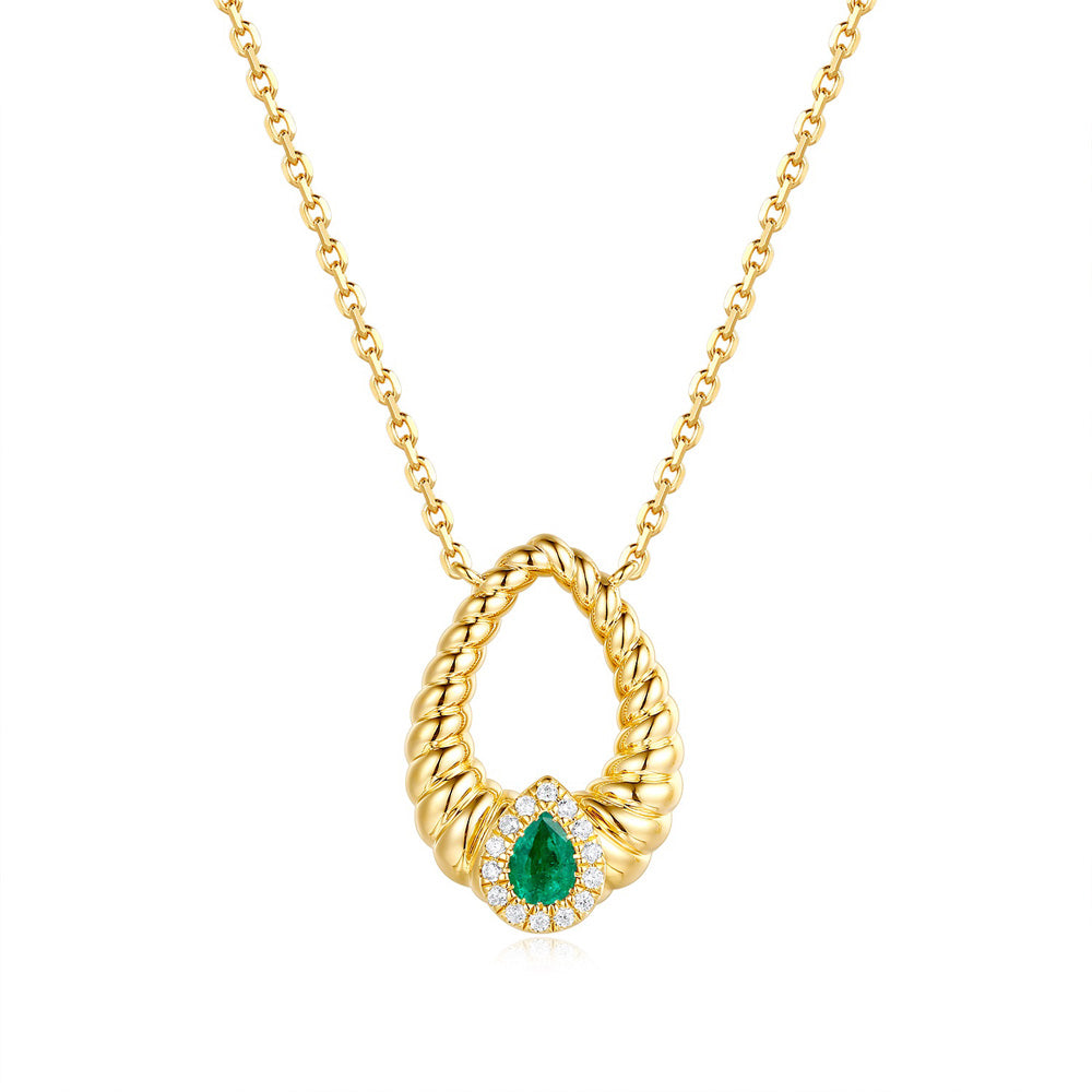 This Necklace is available in 14K Yellow Gold. There are a total of 15 stones. There are Emerald with a total carat weight of 0.2 set in a  setting.There are Rounds stones with a total carat weight of 0.06 set in a .