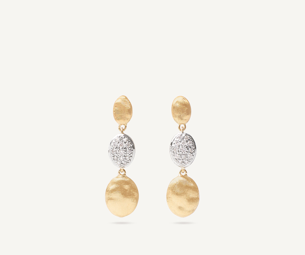 Gold triple earrings with diamonds