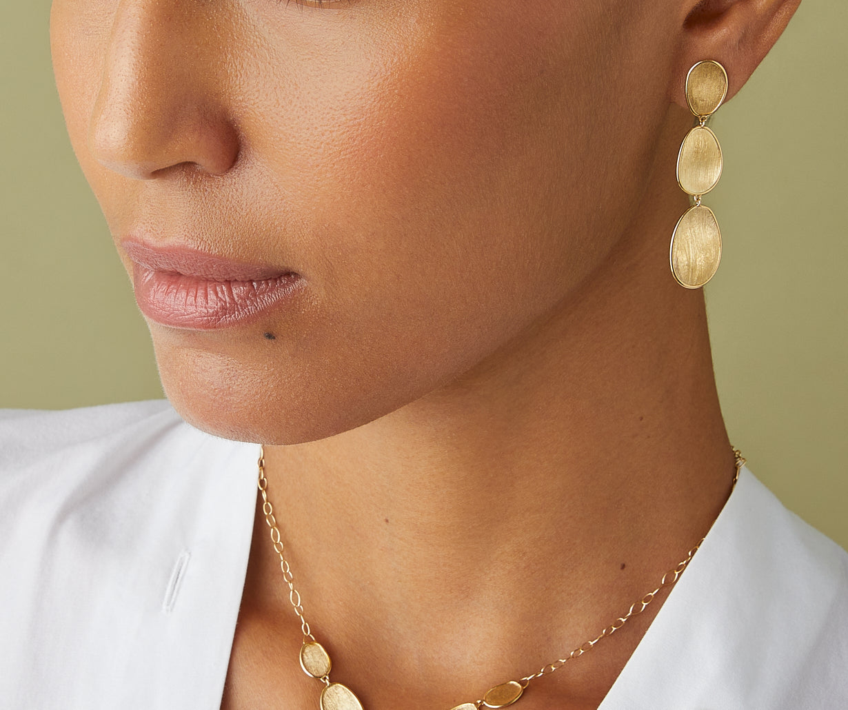 Gold triple earrings