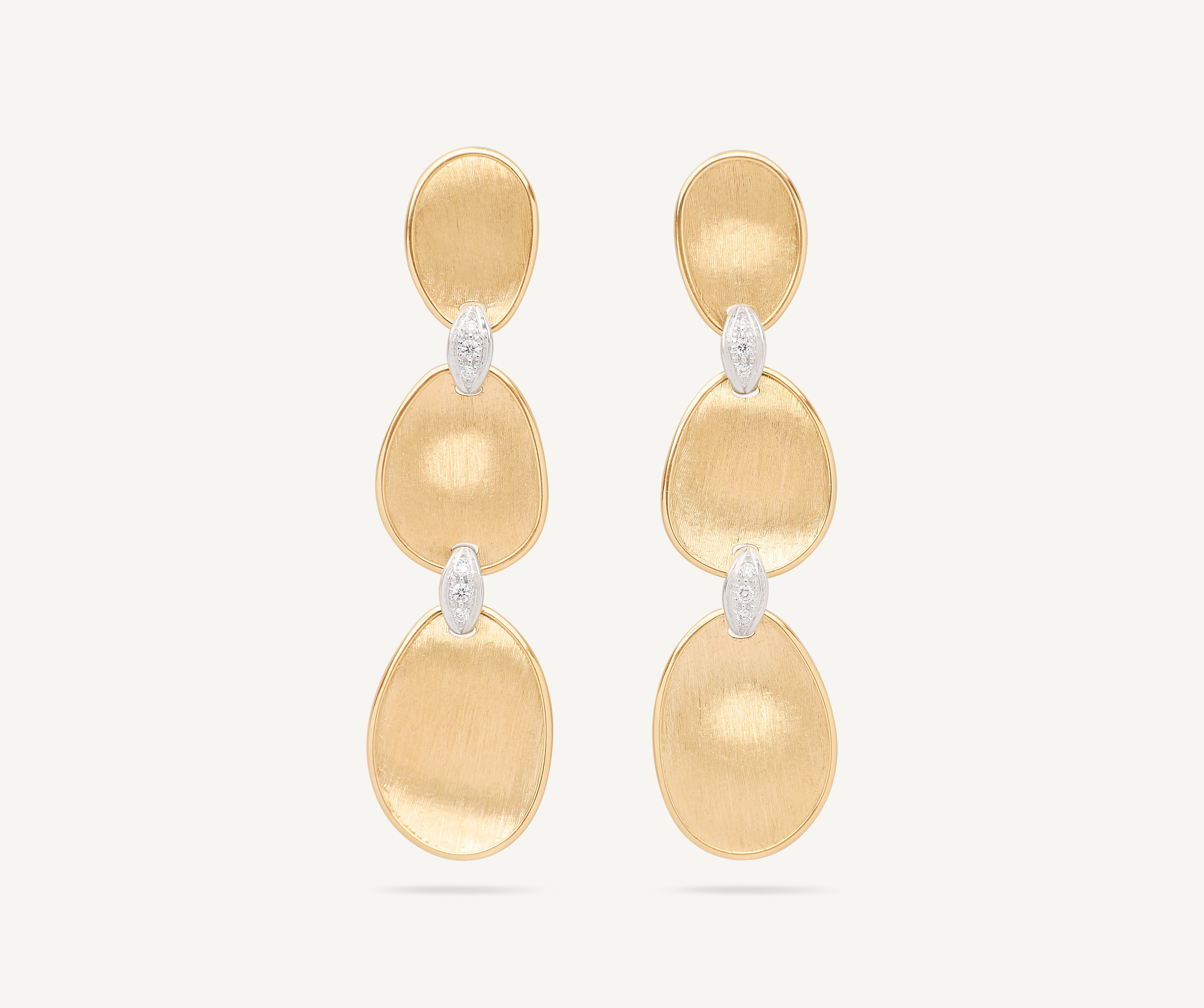 18kt yellow gold triple earrings with diamond accents