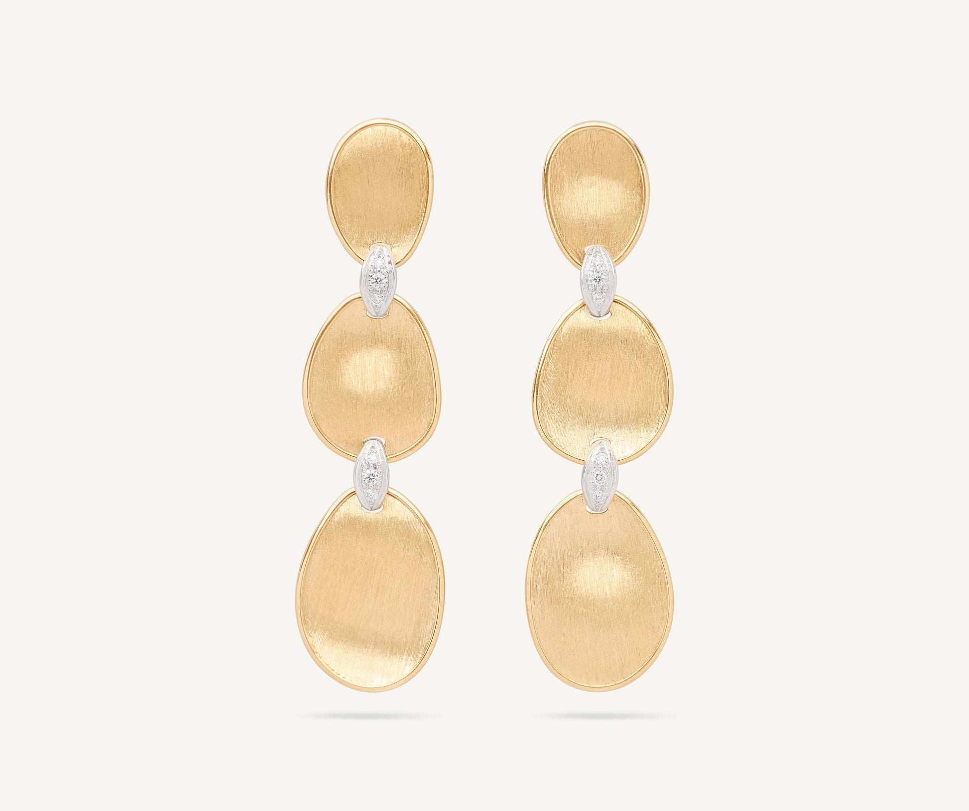 18kt yellow gold triple earrings with diamond accents