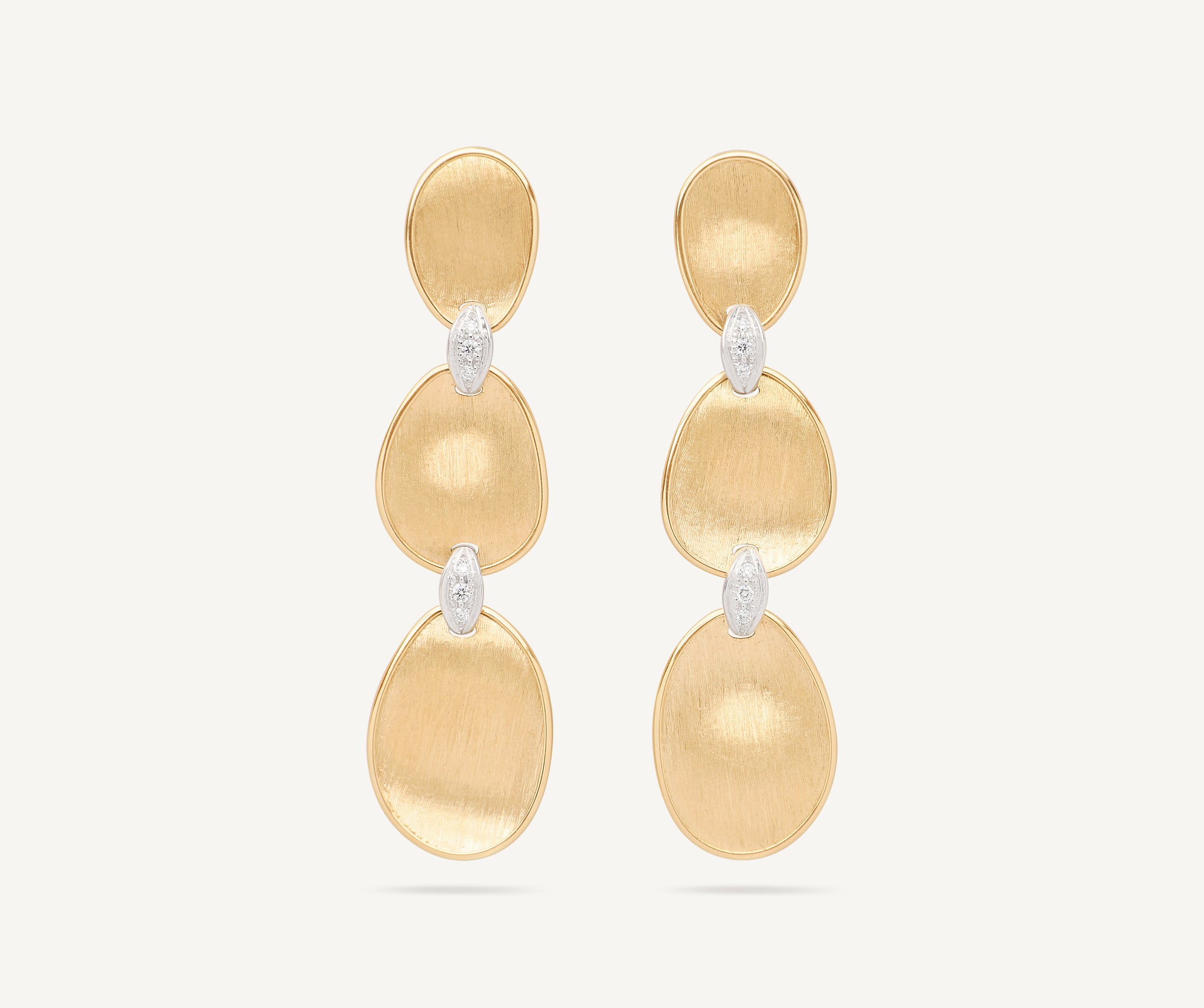 18kt yellow gold triple earrings with diamond accents