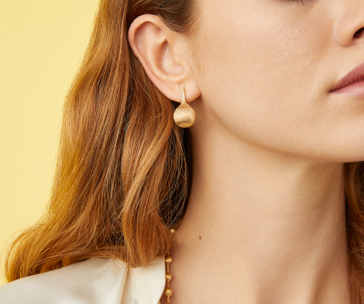 Gold and diamond drop earrings