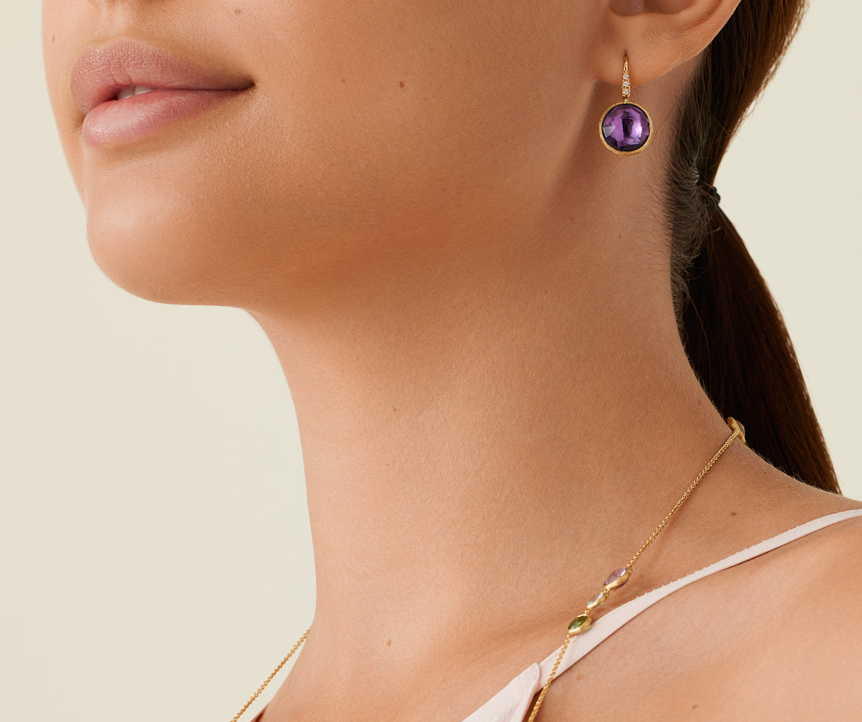 18kt yellow gold diamond-studded amethyst earrings