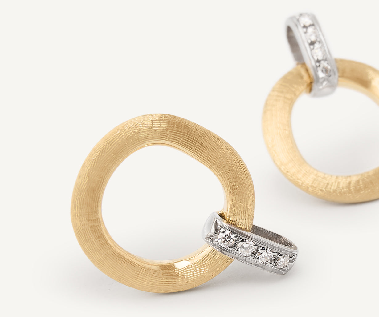 Gold stud earrings with diamonds