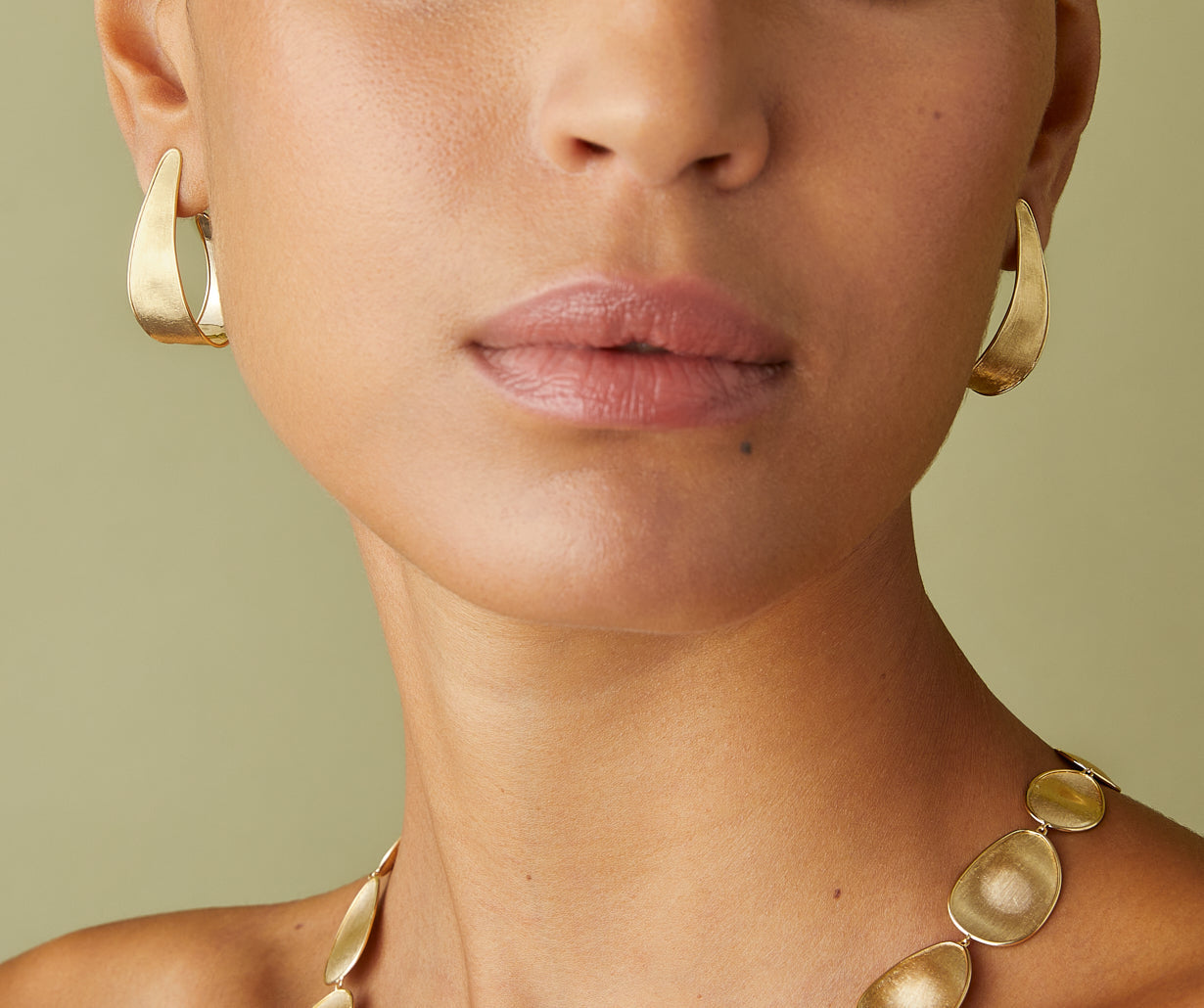 Gold hoop earrings with Florentine technique