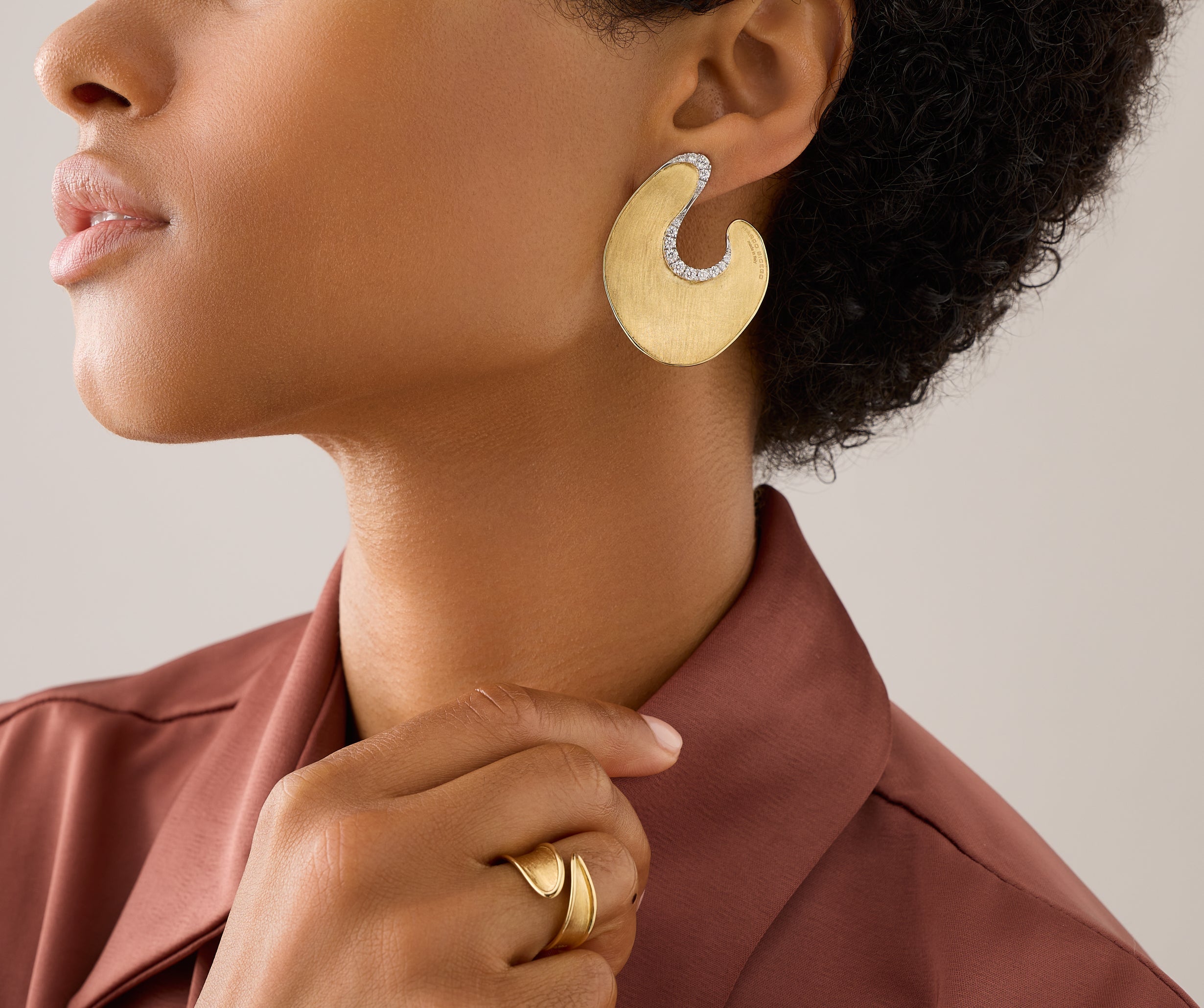 18kt yellow gold irregular leaf earrings with diamonds